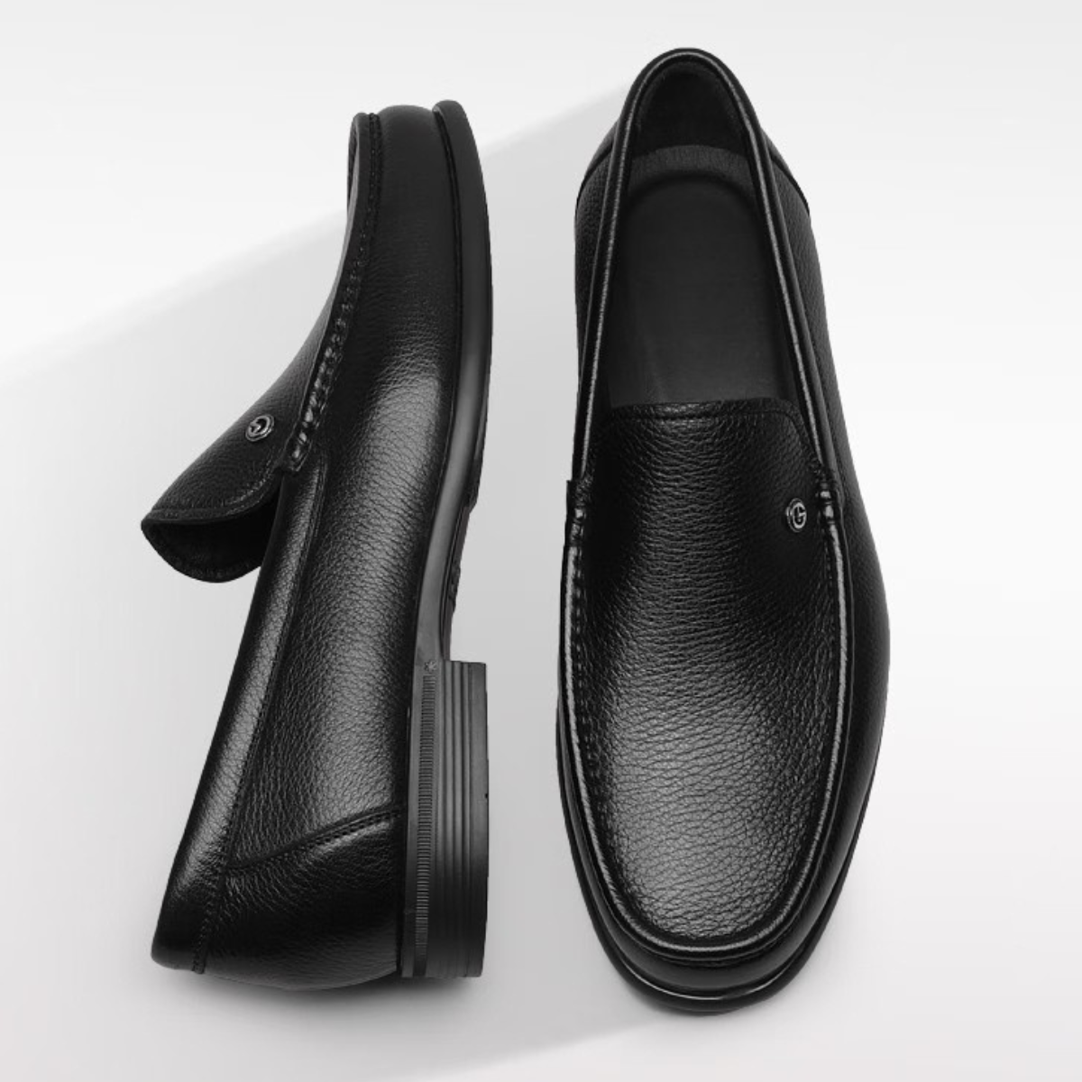 mocassin-homme-cuir-noir-vue-arriere chaussures homme en cuir noir élégant